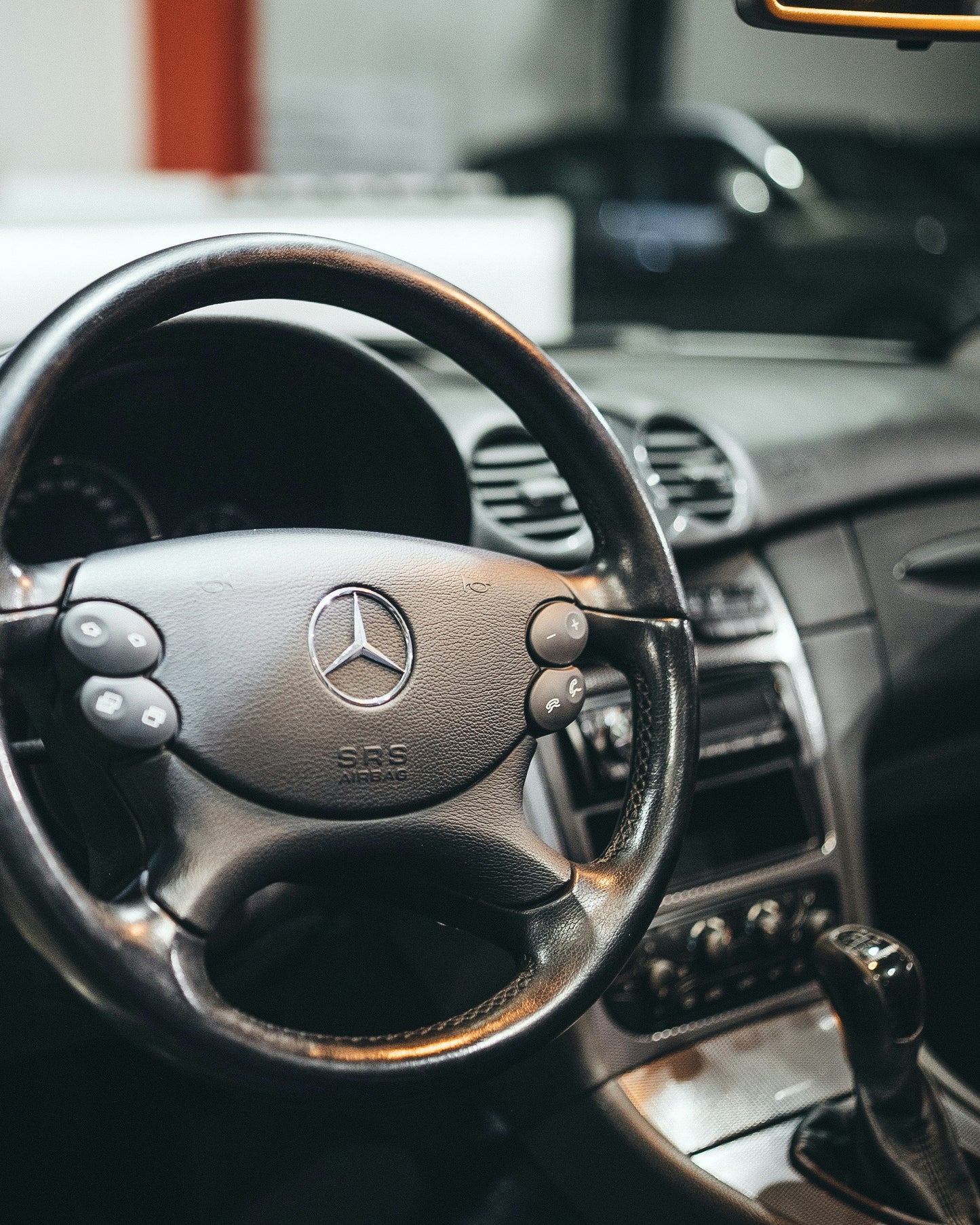 Interior of Mercedes Benz steering wheel and dashboard